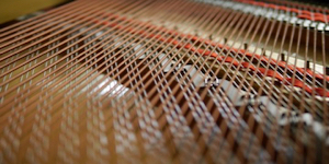 Image of the strings inside a grand piano